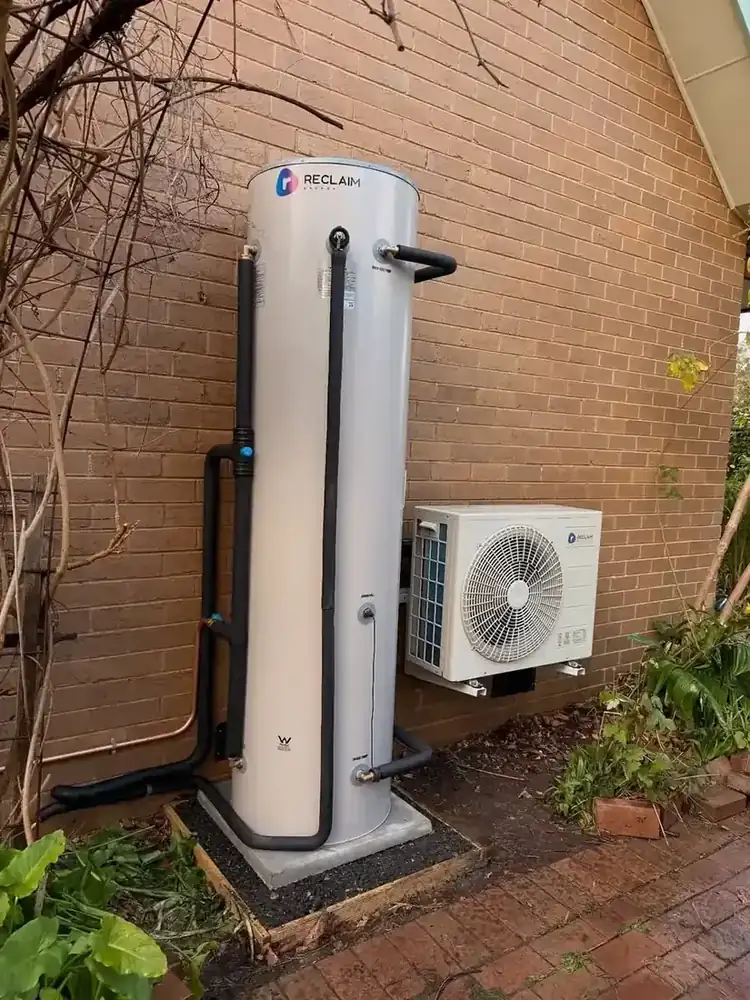 Reclaim heat pump install viewed from the left side of the property