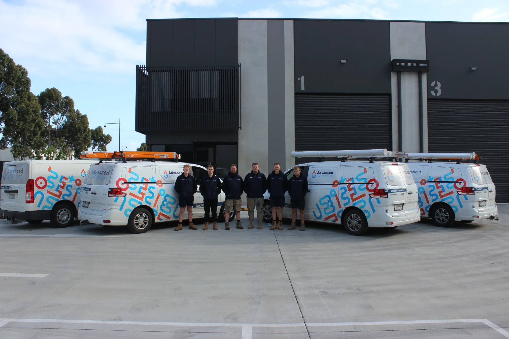 The Advanced Gas & Aircon team with the fleet