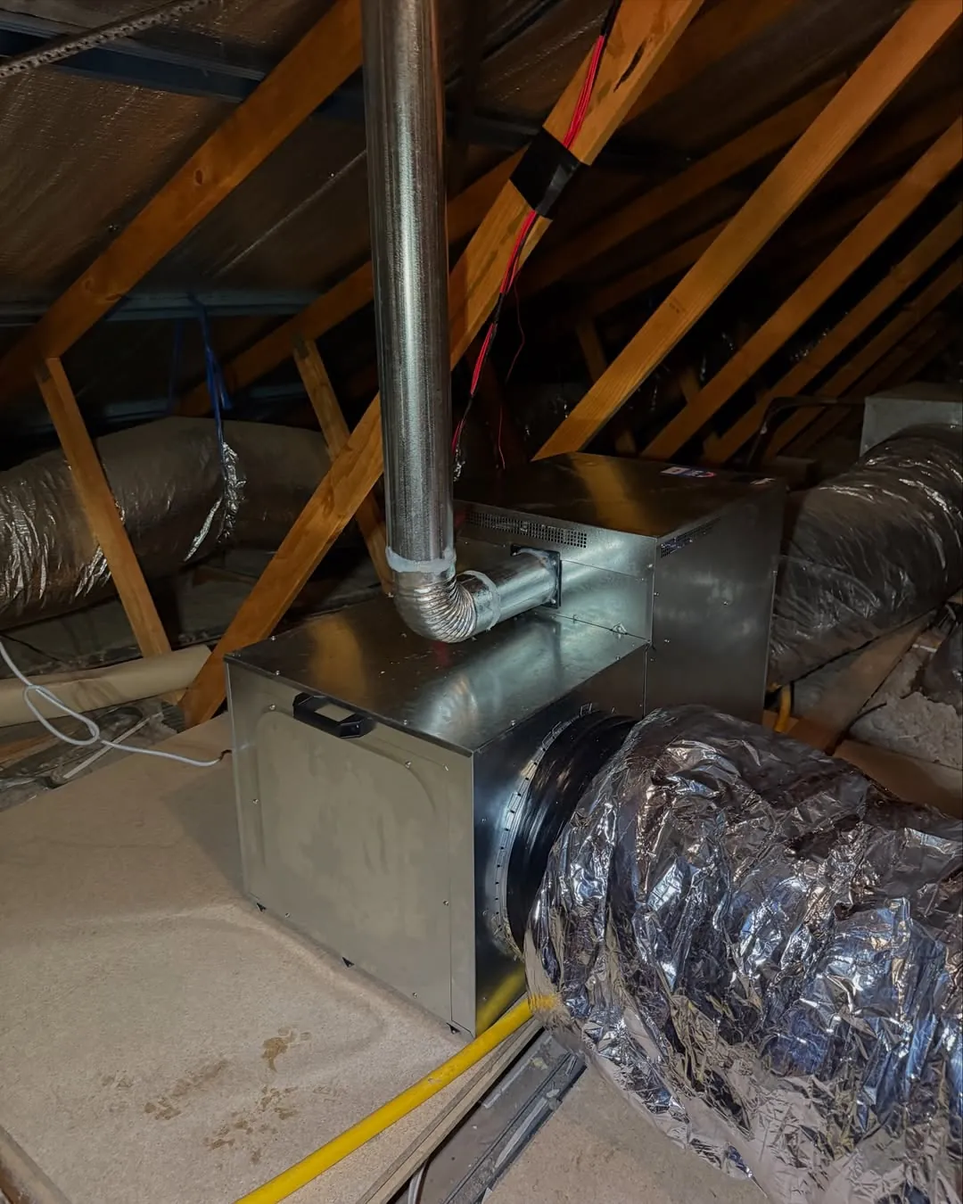 Gas ducted heater installed in an internal cupboard