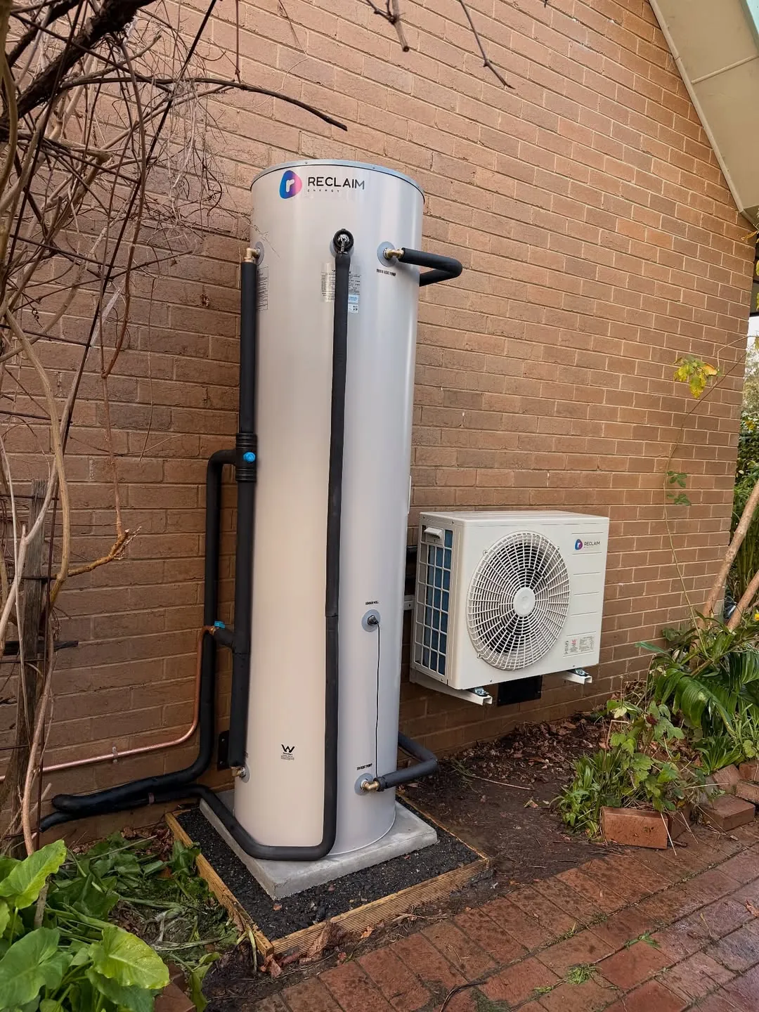 Reclaim heat pump install viewed from the left side of the property